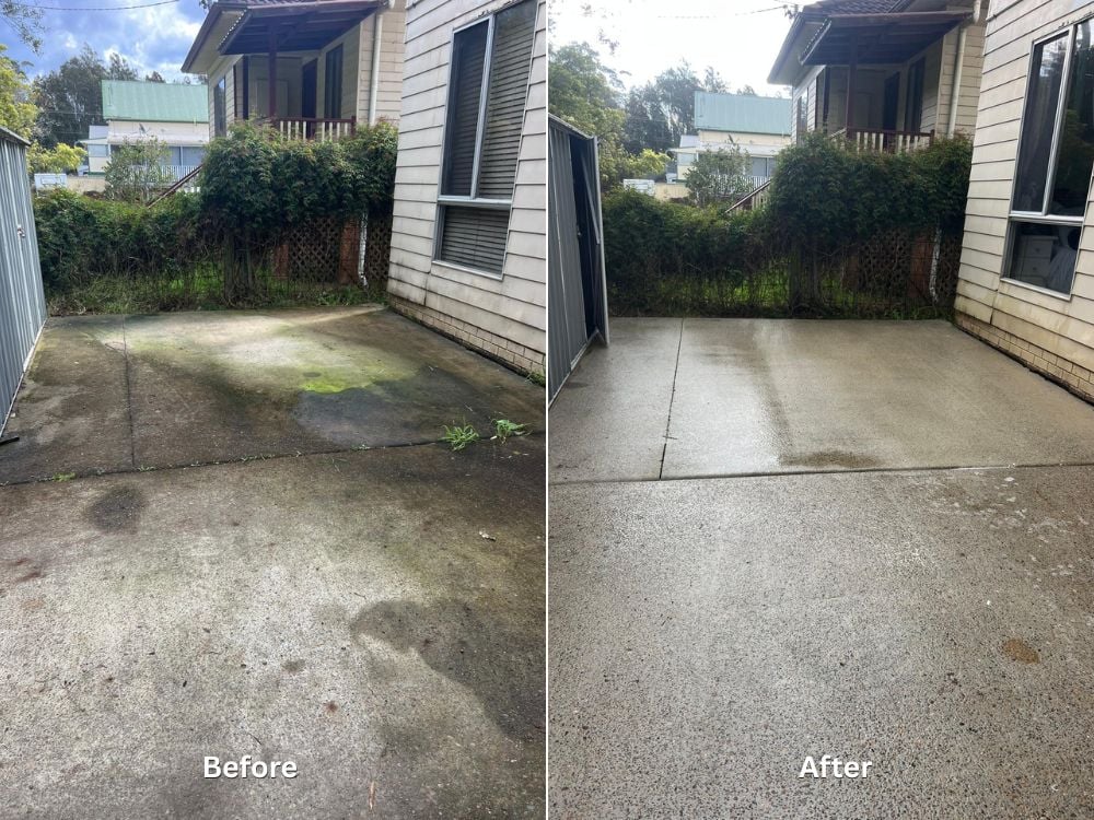 A comparison of a concrete backyard driveway, showing it covered in dark grime and green mold on the left, and freshly pressure-washed to a clean grey finish on the right.
